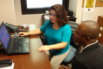 Transitions Manager Andrea Horton-Mericli meets with a student about his career goals and what skills and training are needed to reach them.