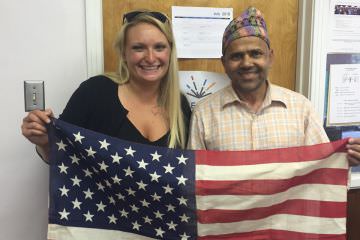 Tutor and Student with flag